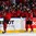 BUFFALO, NEW YORK - JANUARY 5: Canada's Conor Timmins #3 and Victor Mete #28 celebrate a first period goal by Dillon Dube #9 (not pictured) against Sweden with teammates on the players' bench during the gold medal game of the 2018 IIHF World Junior Championship. (Photo by Andrea Cardin/HHOF-IIHF Images)

